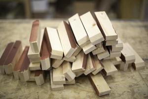 Blanks made of wood. Board in workshop. Details of furniture production. Joinery. photo