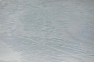 textura de la nieve. el fondo es un llano cubierto de nieve. foto