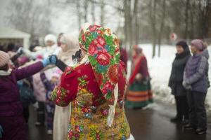 Folk costume. Party on street. Old-fashioned clothes. photo
