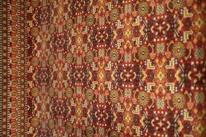 Red carpet in Russia. Fabric with pattern. photo