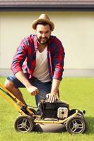 Man mowing the grass photo