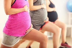 Group of pregnant women during fitness class photo