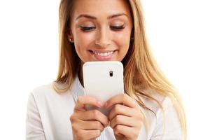 Portrait of Beautiful Young Business woman using mobile phone isolated on white background photo