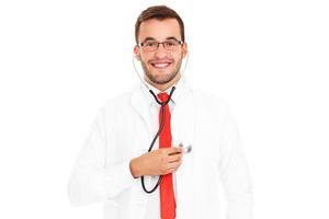 Doctor checking heart rate with stethoscope photo