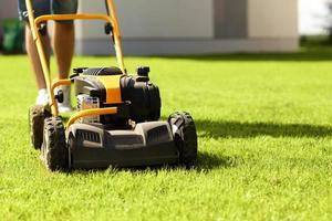 Man mowing the grass photo