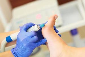 Pedicure in beauty salon photo