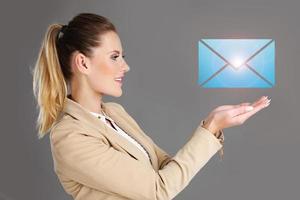 Businesswoman and email sign photo