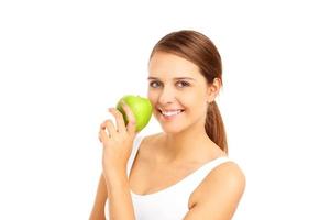 Beautiful woman with green apple photo