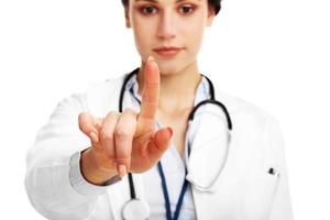 Woman doctor isolated over white background photo