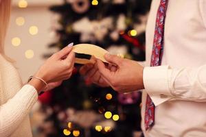 People sharing Christmas wafer in Poland photo