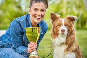 Chocolate White Border Collie with woman owner photo