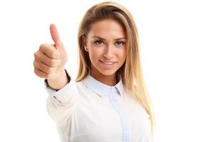 Happy woman showing ok sign over white background photo