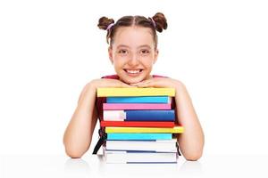 Schoolgirl with books photo