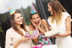 Group of friends celebrating birthday photo