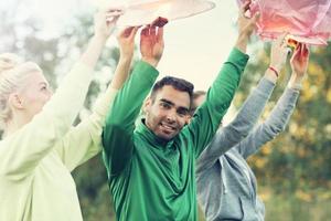 Group of friends floating chinese lanterns photo