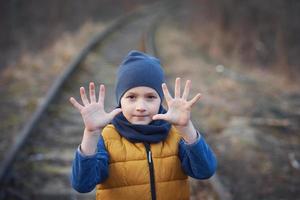 Picture of a child with a lot of love and peaceful message photo