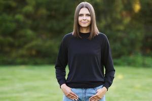 Young woman in black blouse photo