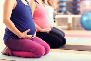 Group of pregnant women during fitness class photo