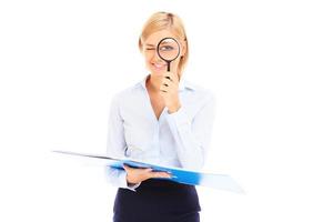 Accountant with magnifier photo