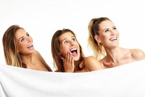 Group of friends in towels photo