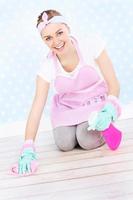 Woman cleaning floor photo