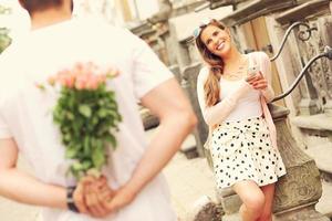 Young romantic couple on a date in the city photo