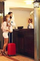 Family checking in hotel photo