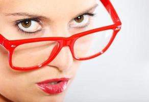 Woman in red glasses photo