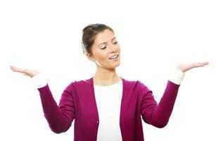 Young woman with arms raised up photo