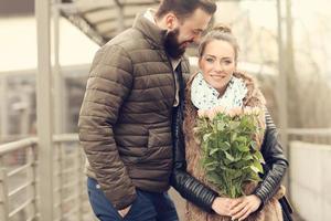 Romantic couple with flowers photo