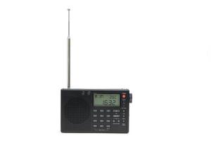 Digital radio receiver with extended antenna white background. photo