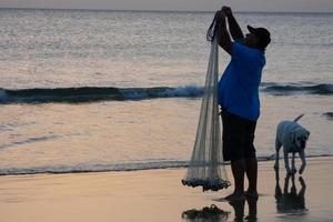 Beach shore fishing, traditional fishing as a hobby photo