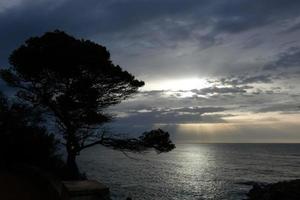 Clouds and light effects in the sky at dawn or dusk. photo