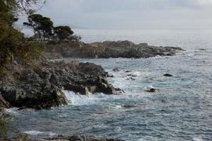 Costa brava and coastal path along the rugged coastline of northern catalonia, Spain photo