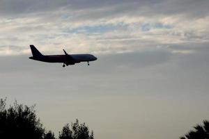 aircraft taking off from or landing at an airport photo