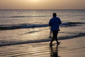 Beach shore fishing, traditional fishing as a hobby photo