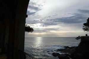 Mediterranean coastline with rocks in the catalan region, Spain photo