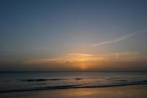 sunset and sunset on the sea photo