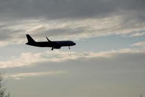 aircraft taking off from or landing at an airport photo