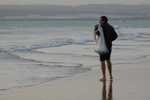 Beach shore fishing, traditional fishing as a hobby photo