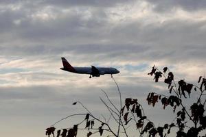 aircraft taking off from or landing at an airport photo