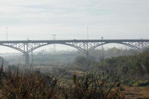 Modern bridge spanning a river, an engineering feat photo