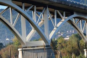 Modern bridge spanning a river, an engineering feat photo