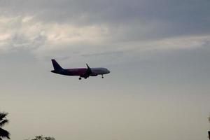 aircraft taking off from or landing at an airport photo