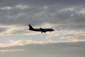 aircraft taking off from or landing at an airport photo