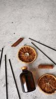 Citrus reed diffuser with cinnamon, dry orange. Parfum for home. photo