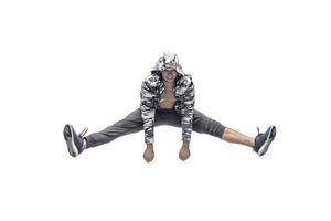 male model doing break dance routine. isolated on white background photo