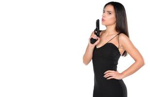 beautiful dangerous women holding a gun photo