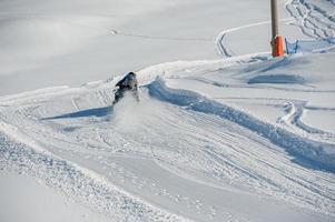 Ski slope with ski lift photo