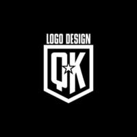 QK initial gaming logo with shield and star style design vector